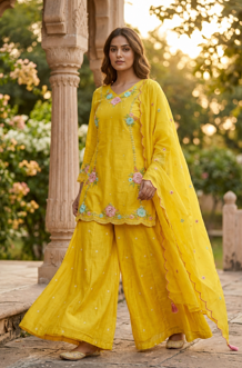 Luxury bridal sharara set items on display racks inside our boutique in Arera Colony Bhopal